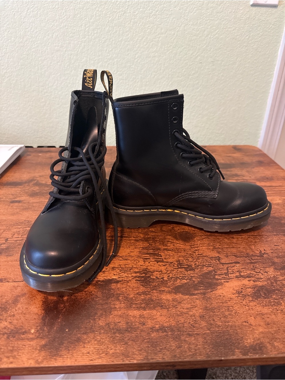 Dr. Martens Black Leather 8-Eye Lace-Up Boots with Yellow Stitching